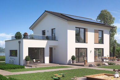 Großes, Zweistöckiges Modernes Einfamilienhaus mit Mix-Fassade, weißer Fassadenfarbe, Satteldach, Ziegeldach und grauem Dach in Stuttgart