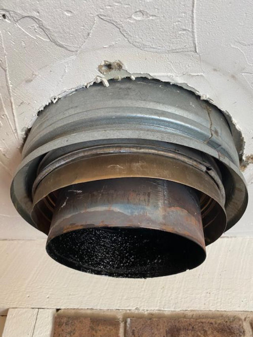 How to repair a wood stove pipe hole in ceiling?