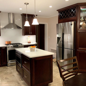 Refrigerator doesn't look so bulky when it is surrounded by the tall columns..Fu