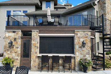 This is an example of a classic back metal railing terrace in Minneapolis.