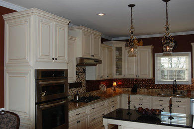 Example of a tuscan kitchen design in Other