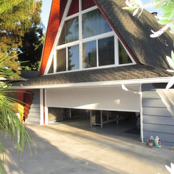 Motorized Power Screen Installed on Garage Door - Products
