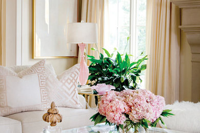 Example of a transitional living room design in Little Rock with a standard fireplace