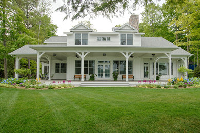 Inspiration for a large traditional shade backyard formal garden in Other for summer.
