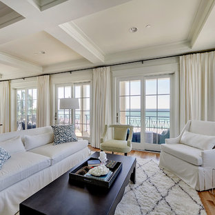 Beach style open concept medium tone wood floor living room photo in Miami