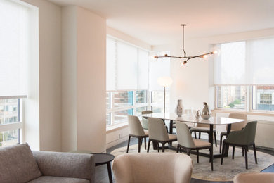 Example of a trendy dining room design in New York