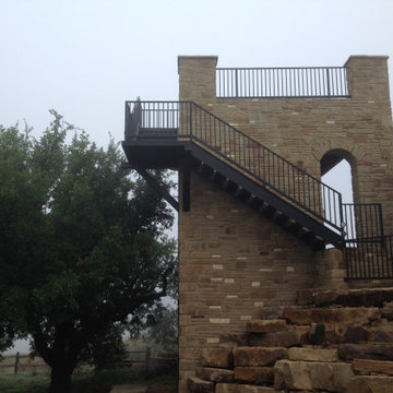 Overhead view of resort style pool, flagstone decking and artificial turf