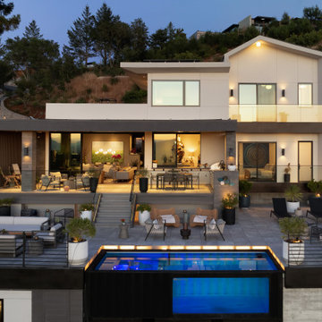 A little farm below a hillside resort-style off-the-grid view home