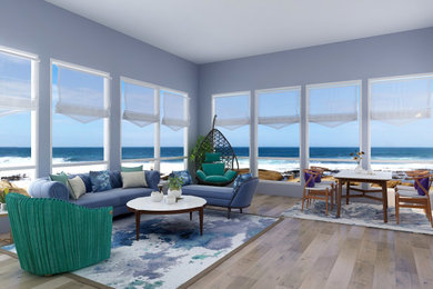 Example of a beach style home design design in Other