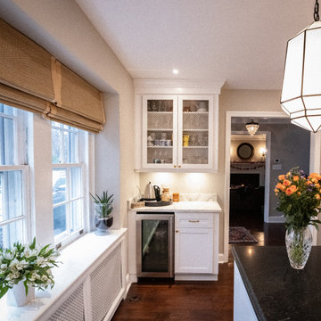 Luxury Transitional Kitchen Remodel | White Cabinets & Black Island Countertops