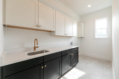 Example of a laundry room design in Other
