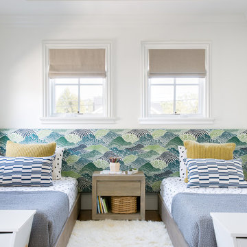 Playful Kids’ Bedroom with Twin Beds and Patterned Headboard