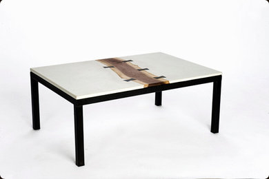 The 'butterfly' table.  Concrete, walnut, ebony, and steel coffee table