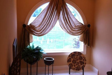 Mid-sized transitional entryway photo in Other with pink walls and a white front door