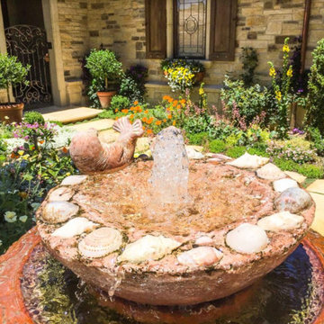 Courtyard antique fountain with abalone shell surround