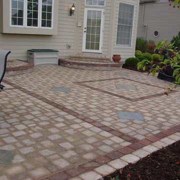 Formal paver patio gardens