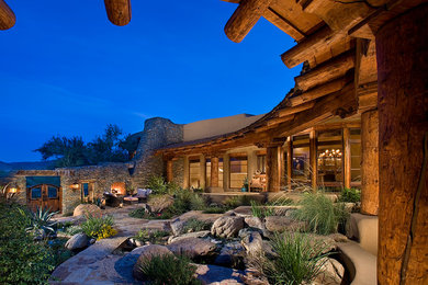 Inspiration for a huge southwestern drought-tolerant courtyard brick water fountain landscape in Phoenix.
