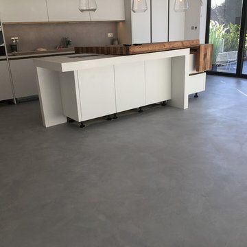 Microcement floor and splash-back in light grey