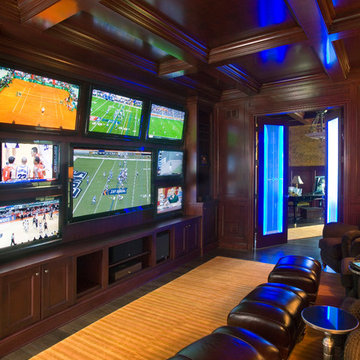 Watch 8 screens at once in this multi-function paneled man cave