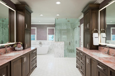 Large transitional master white tile and marble tile porcelain tile, white floor, double-sink and wallpaper bathroom photo in Dallas with recessed-panel cabinets, dark wood cabinets, a two-piece toilet, an undermount sink, quartz countertops, a hinged shower door, pink countertops, a built-in vanity and purple walls