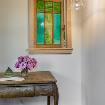 Reclaimed stained glass internal window at desk space.