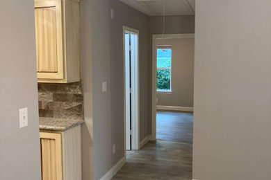 Hallway - contemporary hallway idea in Houston