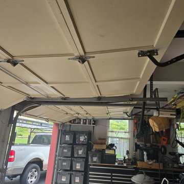(2) New garage doors & openers