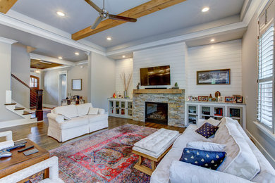 This is an example of an arts and crafts family room in Raleigh.