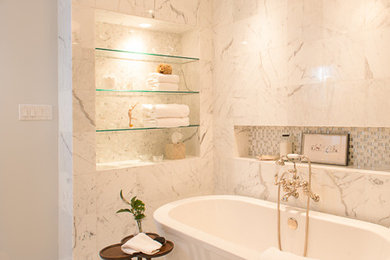 Example of a large transitional master white tile and marble tile marble floor and gray floor freestanding bathtub design in Houston with gray walls