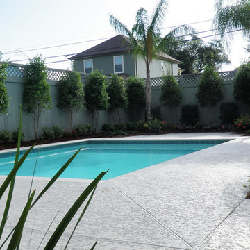 Pool, waterfall, and landscaping