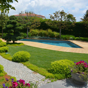 Cem Botanik – Living Pool with Curved Wooden Deck