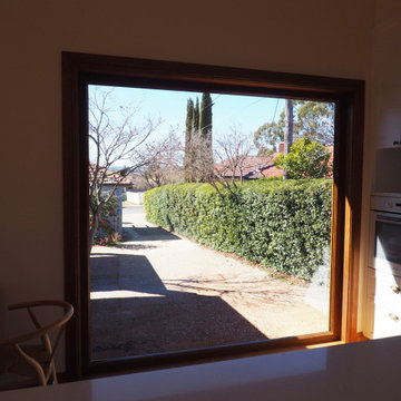 Renovation with new timber-look double glazed windows and doors
