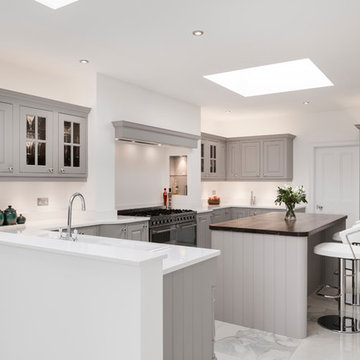 Upcycled grey kitchen with quartz and walnut surfaces