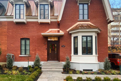 Example of a classic exterior home design in Montreal