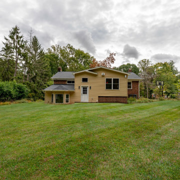 Cheerful Multi Level Rear Addition to Expand Kitchen, Mudroom & Sunroom in Oakt