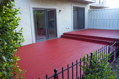 Tiered Back Deck Stained / Painted Red in Ocean View, NJ