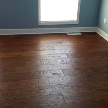 White Family Dining Room featuring Hallmark Floors Alta Vista Carmel Oak