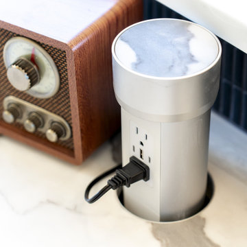 Eclectic Commercial Café Showroom with Point Pod Countertop Power