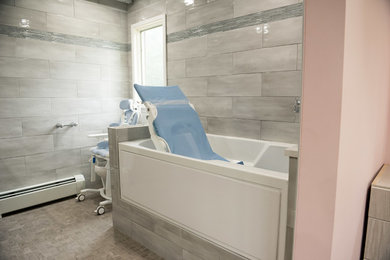 Bathroom - large modern 3/4 ceramic tile porcelain tile and multicolored floor bathroom idea in Providence with gray walls, an integrated sink, quartz countertops and white countertops