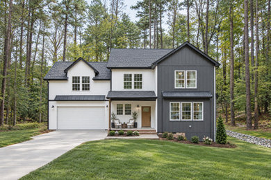 Example of a transitional exterior home design in Raleigh