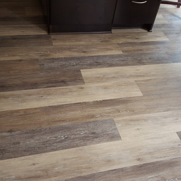 COREtec Plus 7" Vinyl Plank in Blackstone Oak - Carmel Valley Home