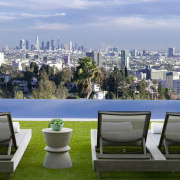 Los Tilos Hollywood Hills modern home backyard hillside pool terrace with city v