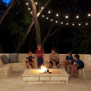 Photo of a contemporary patio in Austin with a fire feature.