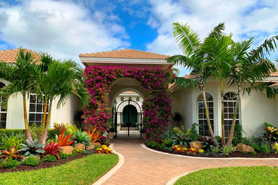 Inspiration for a tropical home design remodel in Miami