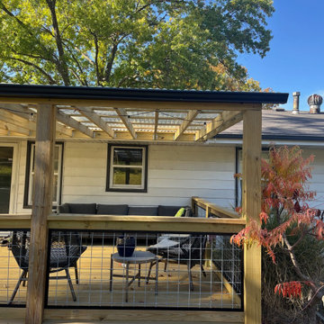 Covered Ground-Level Deck in Lake Waukomis, MO