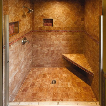 Triangular shower bench, Tuscan-inspired tile