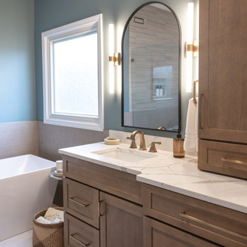 Spa Like Primary Bathroom Remodel with Warm Wood & Brass Details