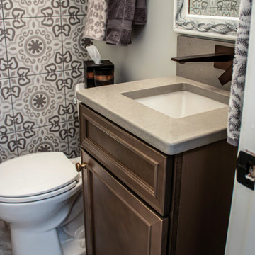 Maple Stained Shaker Wet Bar with Matching Tile in Powder Room