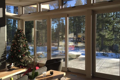 Inspiration for a mid-sized timeless light wood floor and brown floor sunroom remodel in Seattle with a standard ceiling