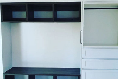 This is an example of a modern storage and wardrobe in Gold Coast - Tweed.